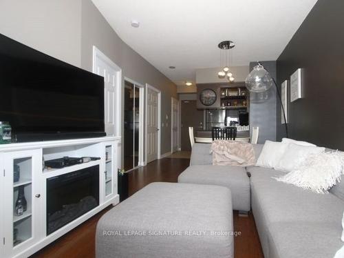 1108-2365 Central Park Dr, Oakville, ON - Indoor Photo Showing Living Room