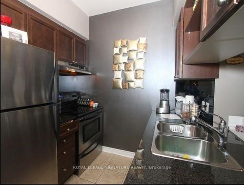 1108-2365 Central Park Dr, Oakville, ON - Indoor Photo Showing Kitchen With Double Sink