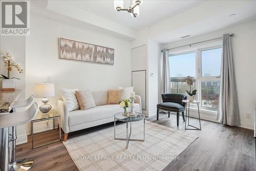 334 - 128 Grovewood Common, Oakville, ON - Indoor Photo Showing Living Room