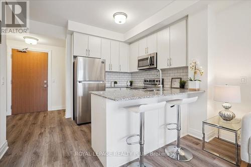 334 - 128 Grovewood Common, Oakville, ON - Indoor Photo Showing Kitchen With Stainless Steel Kitchen With Upgraded Kitchen