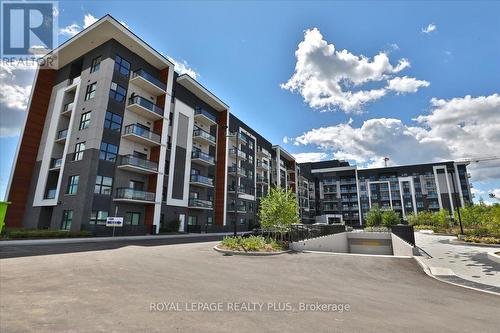 334 - 128 Grovewood Common, Oakville, ON - Outdoor With Balcony With Facade