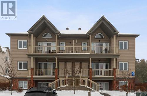 14 - 362 Wood Acres Grove, Ottawa, ON - Outdoor With Balcony With Facade