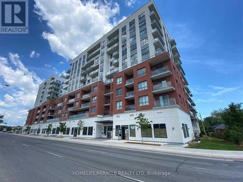 619 - 22 East Haven Drive, Toronto, ON - Outdoor With Balcony With Facade