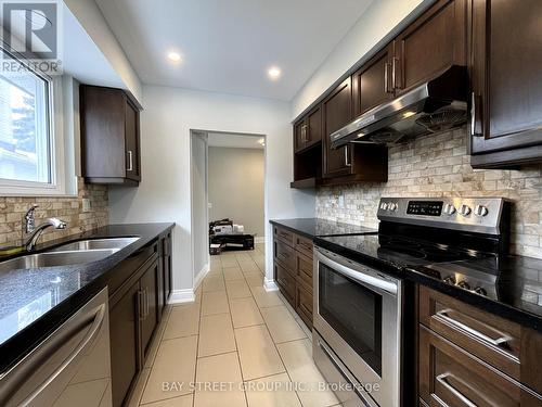 Main Fl - 28 Sandrift Square, Toronto, ON - Indoor Photo Showing Kitchen With Double Sink