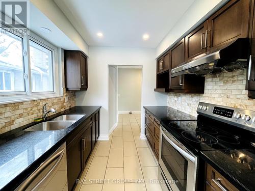 Main Fl - 28 Sandrift Square, Toronto, ON - Indoor Photo Showing Kitchen With Double Sink