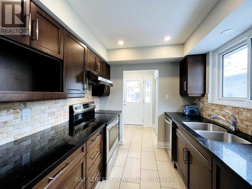 Main Fl - 28 Sandrift Square, Toronto, ON - Indoor Photo Showing Kitchen With Double Sink