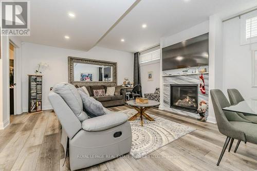 9 - 6 Beckett Drive, Brantford, ON - Indoor Photo Showing Living Room With Fireplace