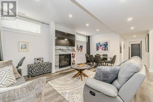 9 - 6 Beckett Drive, Brantford, ON - Indoor Photo Showing Living Room With Fireplace