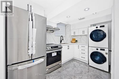 Bsmt - 25 Gemshaw Crescent, Toronto, ON - Indoor Photo Showing Laundry Room