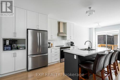 34 Periwinkle Road, Springwater, ON - Indoor Photo Showing Kitchen With Stainless Steel Kitchen With Double Sink With Upgraded Kitchen