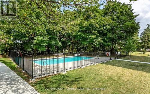 701 - 2301 Derry Road W, Mississauga, ON - Outdoor With In Ground Pool With Backyard