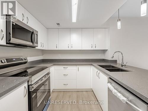 C01 - 350 Fisher Mills Road, Cambridge, ON - Indoor Photo Showing Kitchen With Double Sink