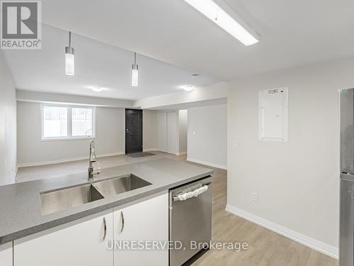 C01 - 350 Fisher Mills Road, Cambridge, ON - Indoor Photo Showing Kitchen With Double Sink