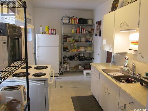 214 2Nd Street E, Nipawin, SK - Indoor Photo Showing Kitchen With Double Sink