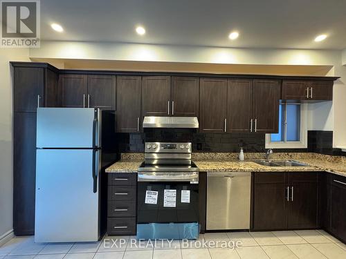 83 Muriel Avenue, Toronto, ON - Indoor Photo Showing Kitchen With Double Sink