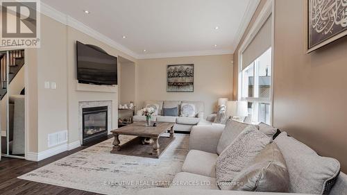 1129 Meighen Way, Milton, ON - Indoor Photo Showing Living Room With Fireplace