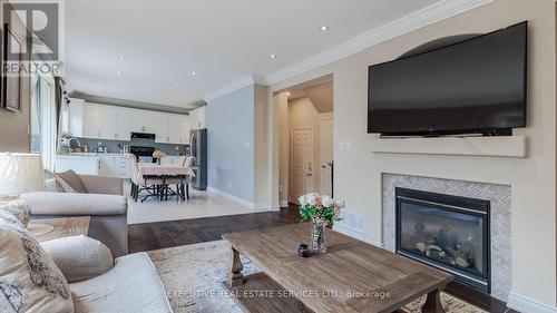 1129 Meighen Way, Milton, ON - Indoor Photo Showing Living Room With Fireplace