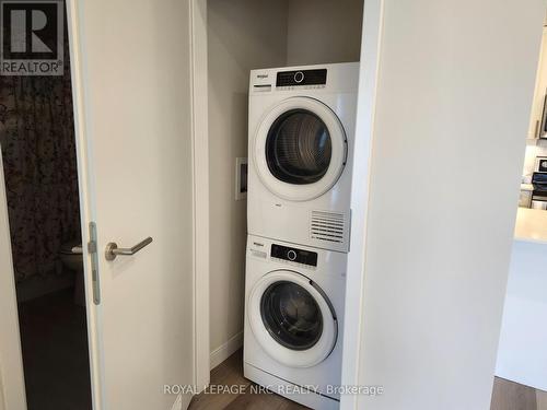 402 - 118 West Street, Port Colborne (878 - Sugarloaf), ON - Indoor Photo Showing Laundry Room