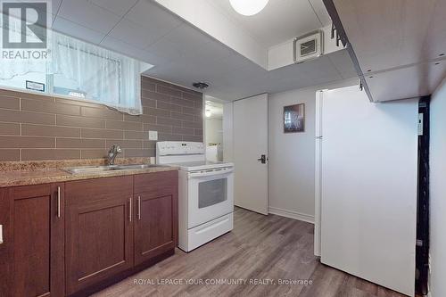 78 Wincott Drive, Toronto, ON - Indoor Photo Showing Kitchen With Double Sink