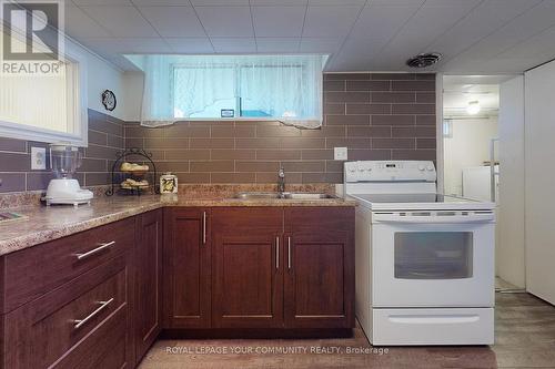 78 Wincott Drive, Toronto, ON - Indoor Photo Showing Kitchen With Double Sink