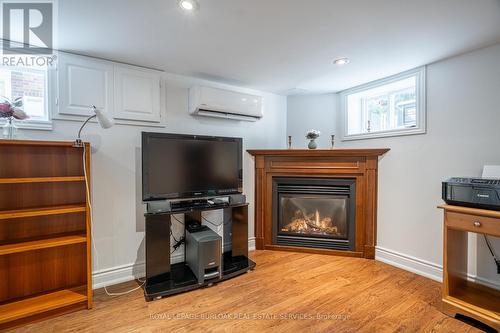 218 Airdrie Road, Toronto, ON - Indoor Photo Showing Living Room With Fireplace