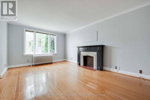 1634A Bathurst Street, Toronto (Humewood-Cedarvale), ON - Indoor Photo Showing Living Room With Fireplace