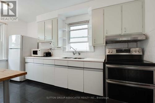 1634A Bathurst Street, Toronto (Humewood-Cedarvale), ON - Indoor Photo Showing Kitchen With Double Sink