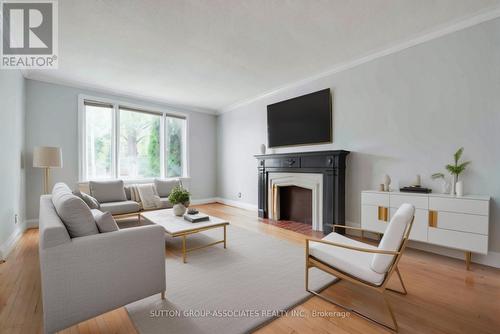 1634A Bathurst Street, Toronto (Humewood-Cedarvale), ON - Indoor Photo Showing Living Room With Fireplace