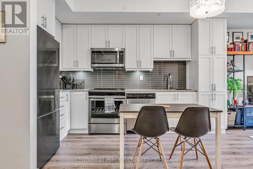 417 - 6235 Main Street, Whitchurch-Stouffville, ON - Indoor Photo Showing Kitchen With Upgraded Kitchen