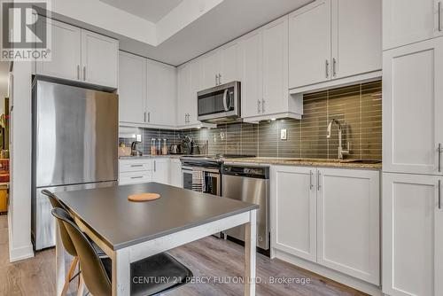 417 - 6235 Main Street, Whitchurch-Stouffville, ON - Indoor Photo Showing Kitchen With Stainless Steel Kitchen