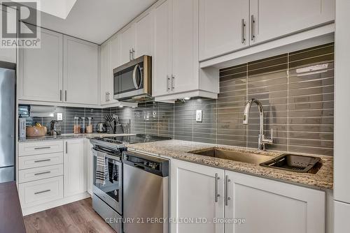 417 - 6235 Main Street, Whitchurch-Stouffville, ON - Indoor Photo Showing Kitchen With Stainless Steel Kitchen With Upgraded Kitchen