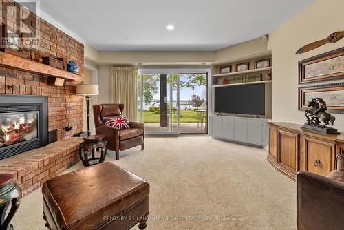 3710 County Rd 3, Prince Edward County (Ameliasburgh), ON - Indoor Photo Showing Living Room With Fireplace