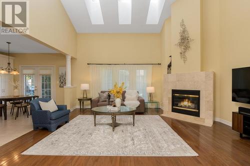 27 - 2165 Stavebank Road, Mississauga (Cooksville), ON - Indoor Photo Showing Living Room With Fireplace