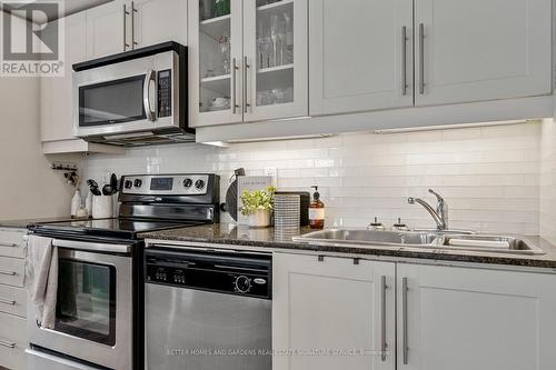 210 - 5 Richgrove Drive, Toronto (Willowridge-Martingrove-Richview), ON - Indoor Photo Showing Kitchen With Stainless Steel Kitchen With Double Sink With Upgraded Kitchen