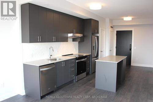 1602 - 3220 William Coltson Avenue, Oakville, ON - Indoor Photo Showing Kitchen With Upgraded Kitchen