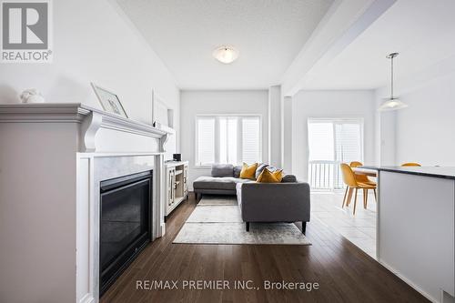 142 Werry Avenue, Southgate, ON - Indoor Photo Showing Living Room With Fireplace