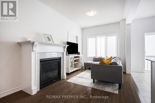 142 Werry Avenue, Southgate, ON - Indoor Photo Showing Living Room With Fireplace