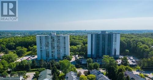 Park-like setting.  Miles of walking trails right behind the building - 55 Green Valley Drive Unit# 211, Kitchener, ON - Outdoor With View