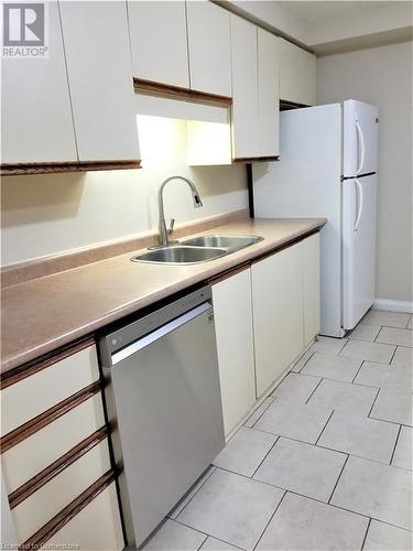 55 Green Valley Drive Unit# 211, Kitchener, ON - Indoor Photo Showing Kitchen With Double Sink