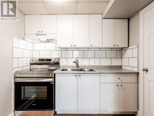 Ground - 60 Tineta Crescent, Toronto, ON - Indoor Photo Showing Kitchen With Double Sink