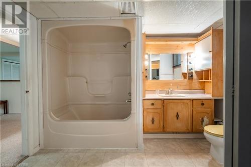 Basement Bathroom and laundry room - 512 Ski Club Road, North Bay, ON - Indoor Photo Showing Bathroom