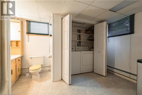 Basement bathroom and laundry room - 512 Ski Club Road, North Bay, ON - Indoor Photo Showing Other Room