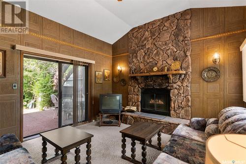 34 O'Neil Crescent, Saskatoon, SK - Indoor Photo Showing Living Room With Fireplace