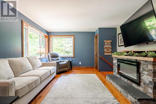 1023 Sophers Landing Road, Gravenhurst, ON - Indoor Photo Showing Living Room With Fireplace