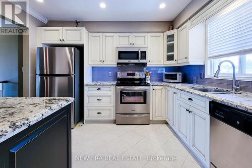 3831 Cardinal Drive, Niagara Falls, ON - Indoor Photo Showing Kitchen With Stainless Steel Kitchen With Double Sink