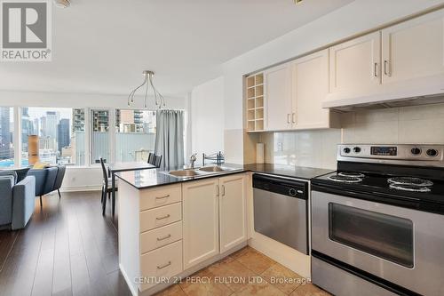 2411 - 210 Victoria Street, Toronto (Church-Yonge Corridor), ON - Indoor Photo Showing Kitchen With Double Sink