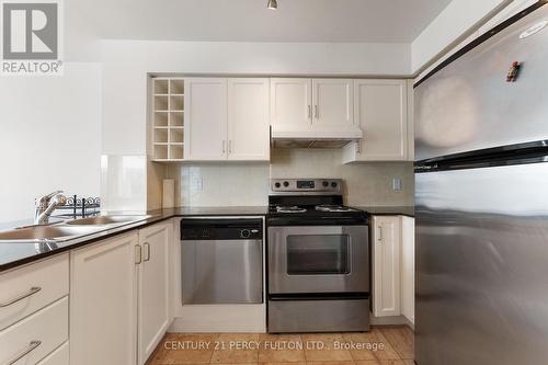 2411 - 210 Victoria Street, Toronto (Church-Yonge Corridor), ON - Indoor Photo Showing Kitchen With Double Sink