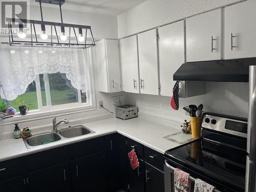 8411 Sparrow Road, Prince George, BC - Indoor Photo Showing Kitchen With Double Sink