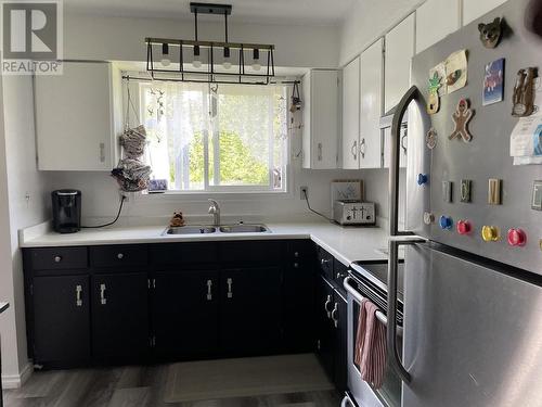 8411 Sparrow Road, Prince George, BC - Indoor Photo Showing Kitchen With Double Sink