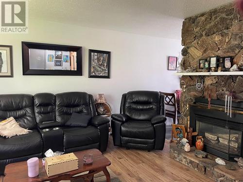 8411 Sparrow Road, Prince George, BC - Indoor Photo Showing Living Room With Fireplace